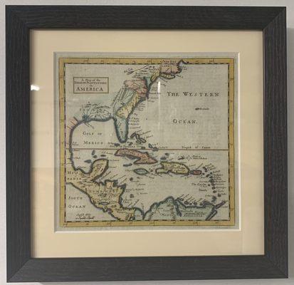 eggshell colored matting to match the color of the map with a black frame