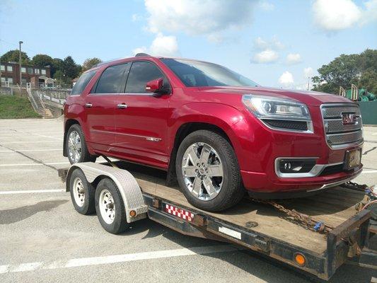 This is loaded on trailer in the GMC lot across the street