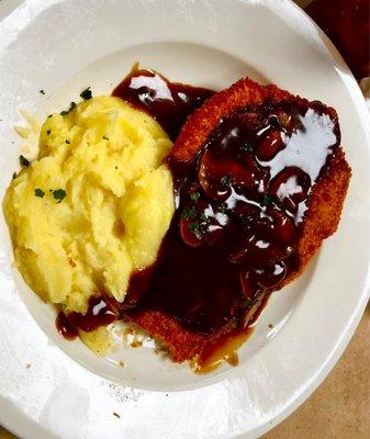 Schnitzel with homemade mashed potatoes.