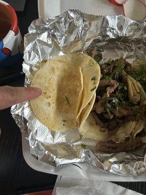 Missing meat from one taco.