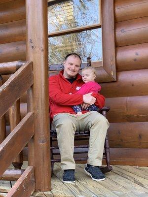 Swimming in paradise cabin front porch rocking chair