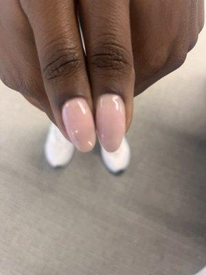 Uneven nail shape and one hand has to have another coat due to lack of polish on brush