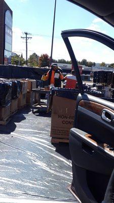 Parking lot is covered with plastic in area of waste disposal