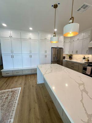 Individual family member lockers (mud room area); cabinet door entrance into hidden pantry and kitchen