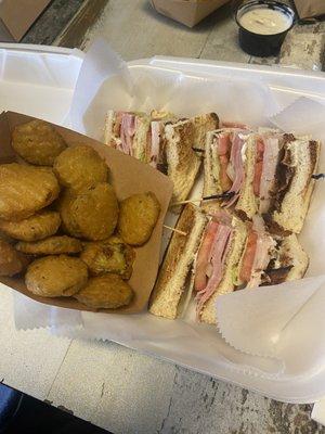 Club sandwich with fried pickles