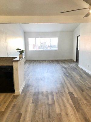 Floorplan for 3 bed 2 bath unit includes tasteful hardwood laminate flooring, breakfast bar, outlets with USB plug, + more.