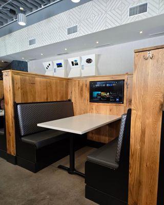 Booths with game consoles