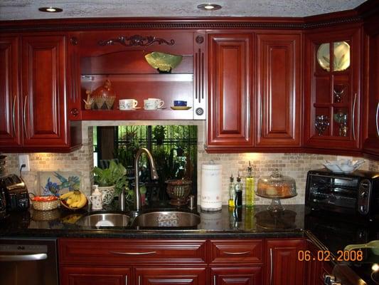 WOOD KITCHEN &CABINETS, WITH GRANITE TOP & APPLIANCES. ALL MADE IN SOLID WOOD AND STAINED.