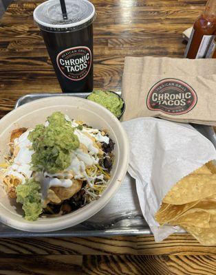 Surf & Turf Burrito in a bowl.  Some Chips & Guacamole