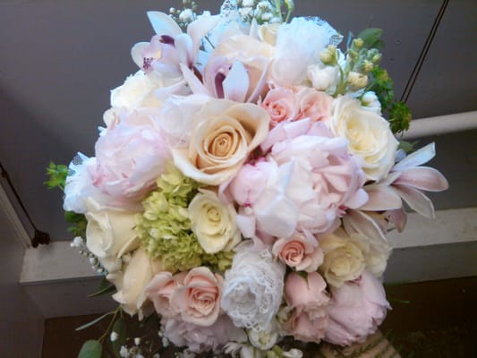 Gorgeous bridal bouquet . We are a full service florist providing all occasion floral designs.