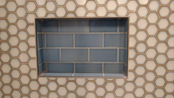 Custom shower tile niche.