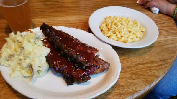 Mashed potatoes, full slab of ribs, and mac n cheese