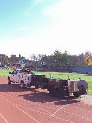 Clean drains lines at Morristown High track