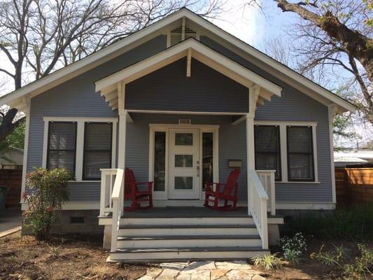 Craftsman Home with custom wood frame screens.