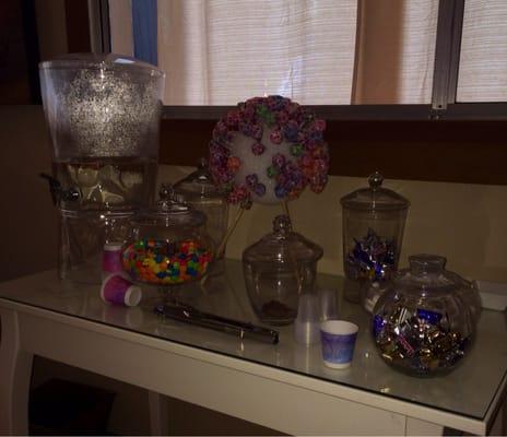 Candy & water station in waiting room.