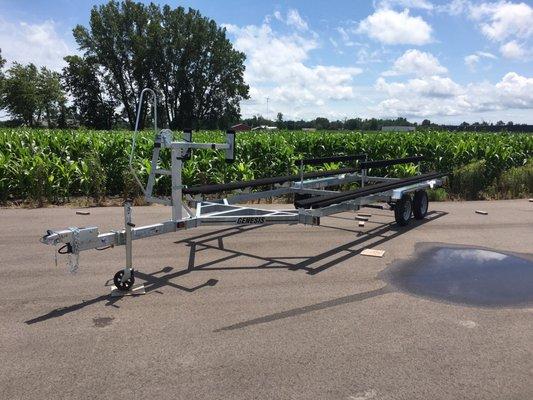 A Genesis 24' float on trailer