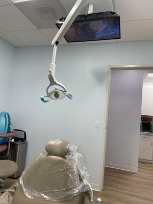 Overhead TV screen for patient's entertainment