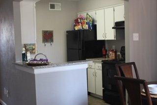 Kitchen With black Appliances