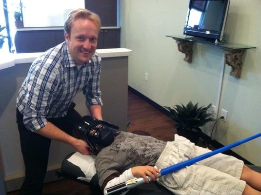 Dr. Jason with his favorite patient, Darth Vader.