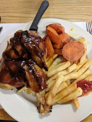 Chicken with BBQ, carrots, and fries