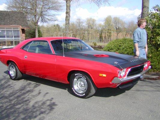 Viper red Challenger with black out hood restoration at NAMC!