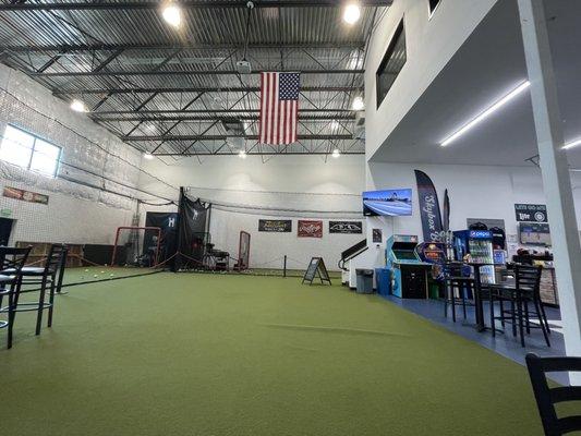 Indoor area with two batting cages