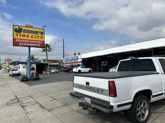 Local shop. Local business. Blue sky's with clouds above.