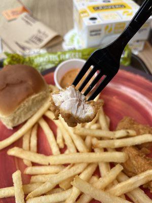 Fried Boneless Wings (chicken nuggets) and campero sauce with french fries