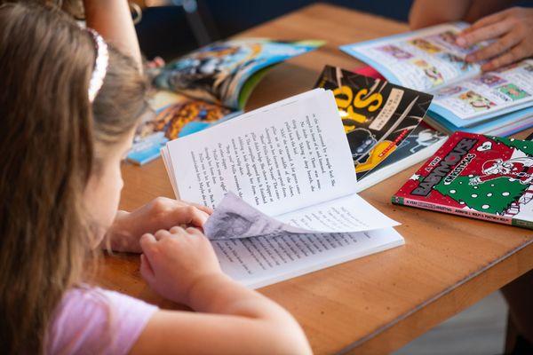 Child reading a book