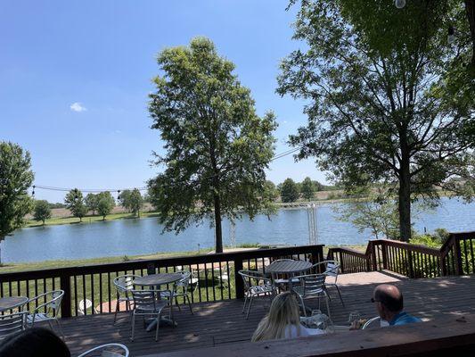 Outdoor dining on their shaded deck