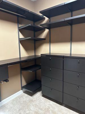 Shelves blocked by drawers.