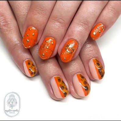 Orange and peach half tortoise shell and half "evil eye"