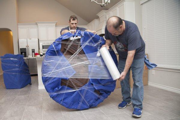 padding and shrink wrap included in all moves