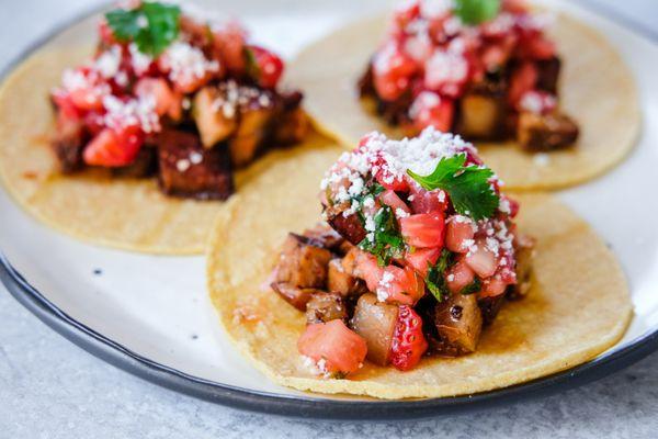 Strawberry Adobo Street Taco - adobo pork belly, cotija, strawberry relish