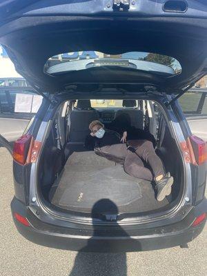 Me testing out the size of my trunk!!