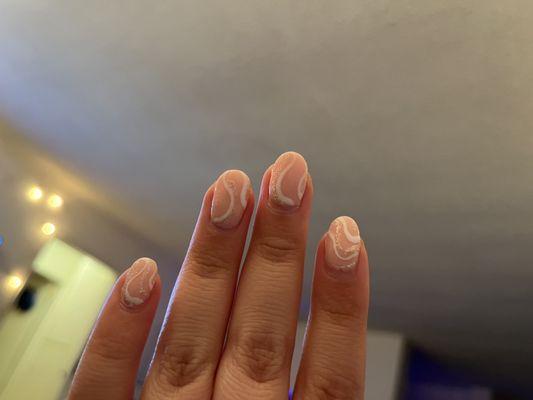 I received a dip manicure with gel design on my natural nails.