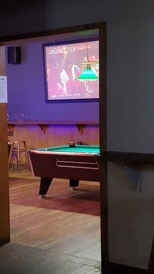 another room with a pool table