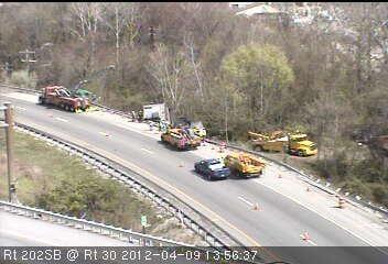 The scene of a tractor trailer accident that was filled with potatoes. Took place on the Rt 202 on ramp.