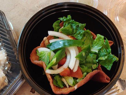 Salad with the gyro plate. I took the mushrooms off and I ate the orange piece before I took the picture