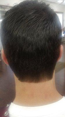 Regular haircut with a 7 on the sides and back. Blocked in the back.