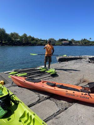 Iwa the owner/operator doing the kayaking briefing before we launched.