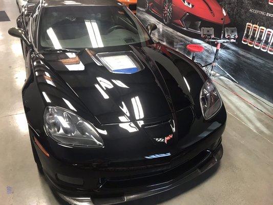 Black vette with a hammered paint job. 3 step paint correction 9h ceramic coating on the wheels and body. Now it's perfect!