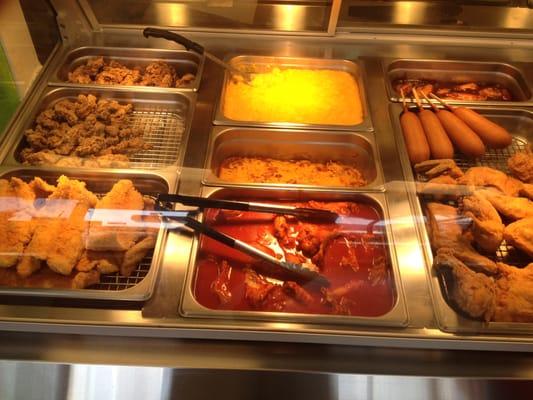 Part of the day's selections - Fried Flounder, Fried Chicken Livers, Fried Chicken Gizzards, Buffalo Wings, & Refried Beans.