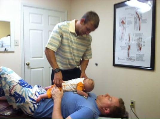 Baby Gaven checking his 4 week old spine checked.