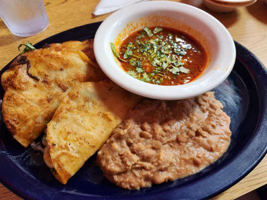 Birria tacos and refried beans - delish!