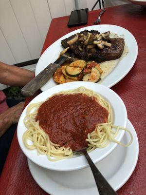 Steak with vegetables side of pasta with red sauce