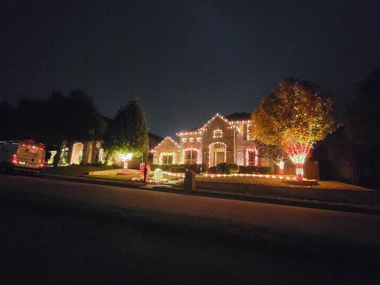 Candy cane roofline, garland, trees & walkway