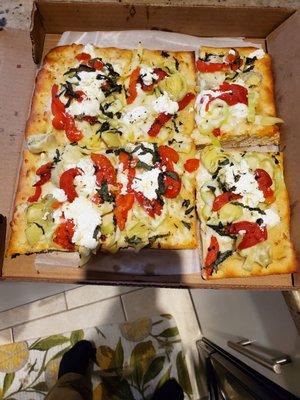 Sicilian with artichokes, roasted peppers, ricotta, basil and hot peppers. Delish!!!!