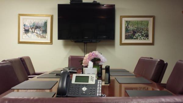 Another view of our conference room, showing our television where we can put on presentations, and have teleconference meetings.