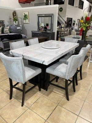 Marble Top Table, Velvet Chairs, and Industrial Wood!